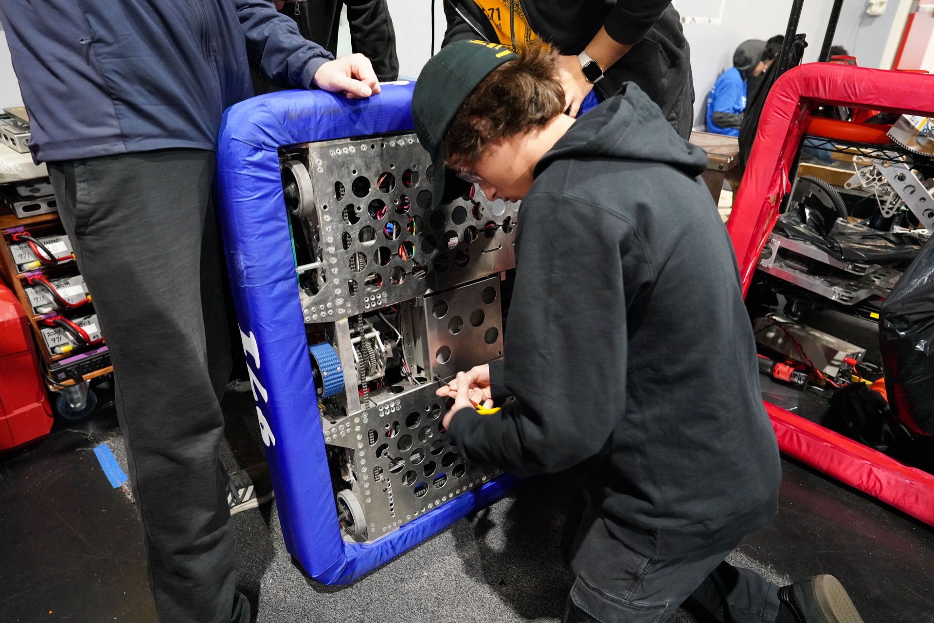 Swapping the battery between matches, pit crew style.