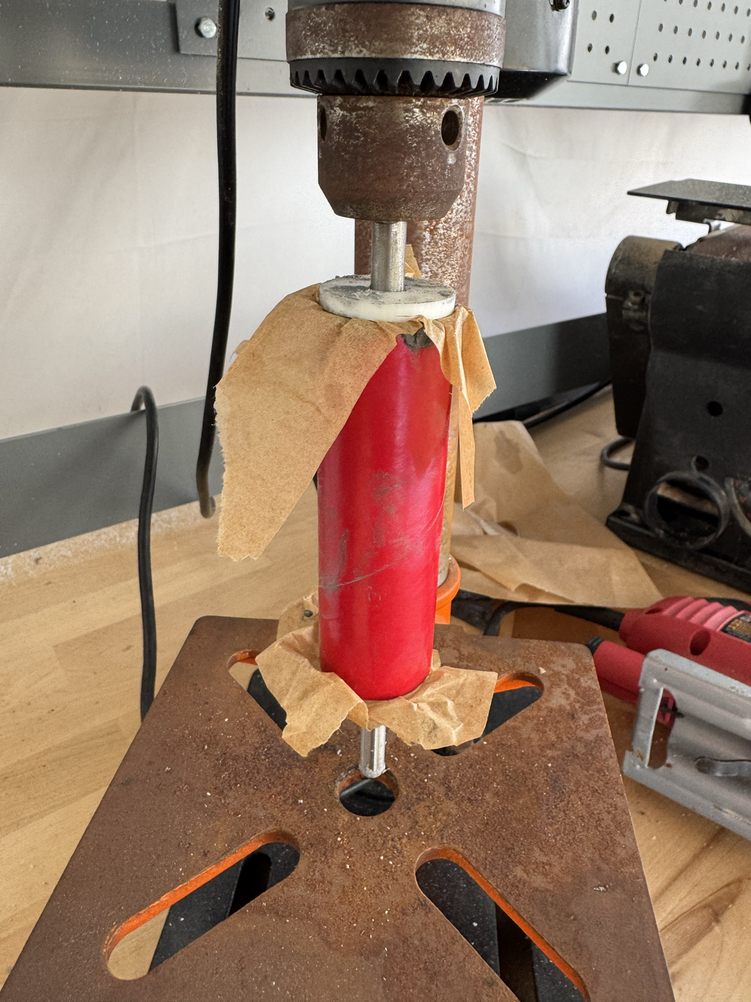 Filling and molding the solid rocket propellant grains.