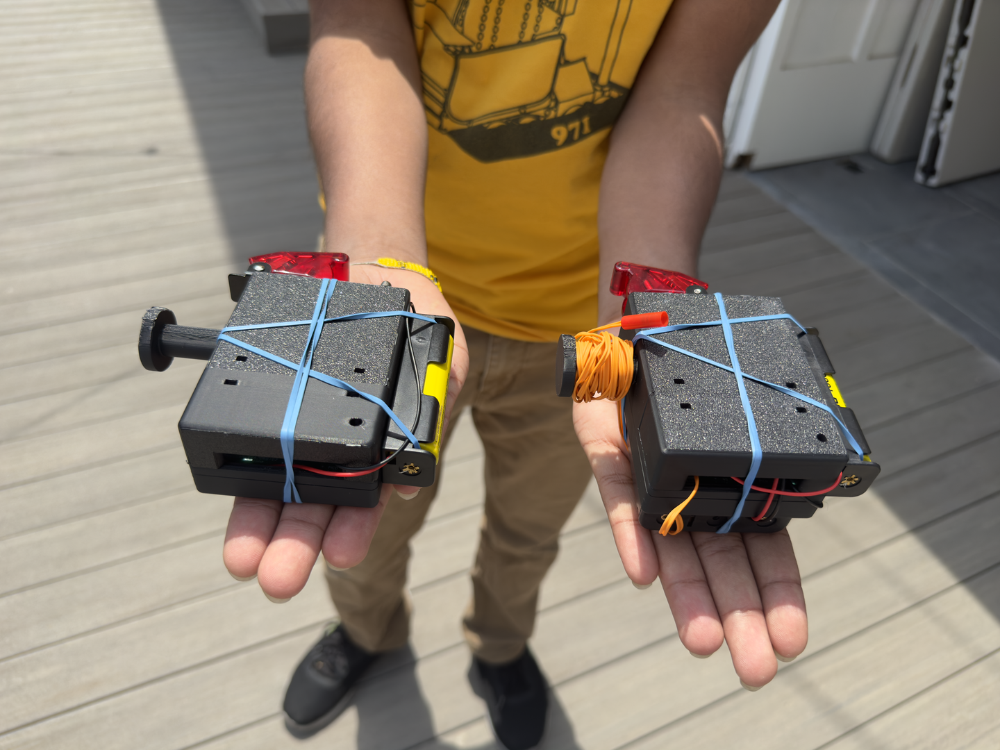 A pair of homemade ignitors to trigger the propellant.